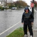 Warren Kurtzman's dad in front of a flooded playground during Superstorm Sandy
